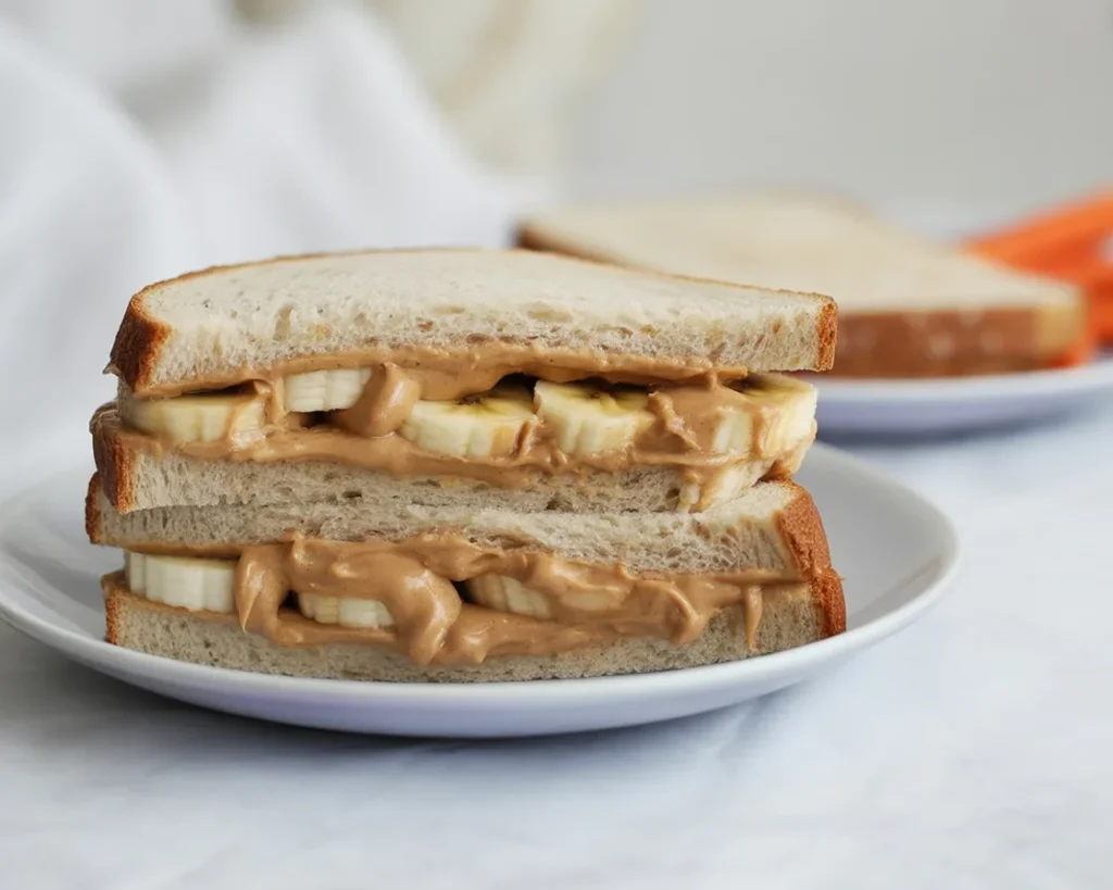 Grilled peanut butter banana sandwich with banana slices and cinnamon.